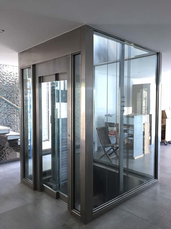 FE3D Carpinterías ascensor metálico y de vidrio